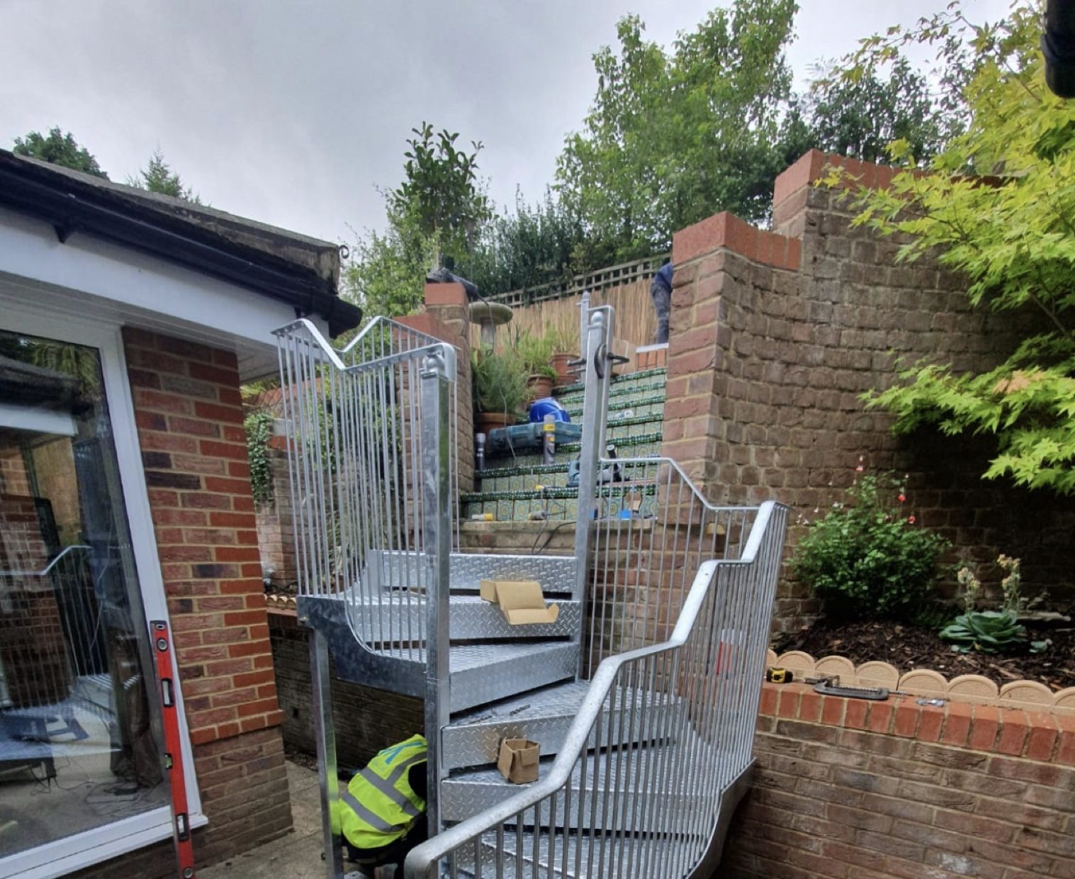 Spiral staircase and glass balcony on a barn conversion