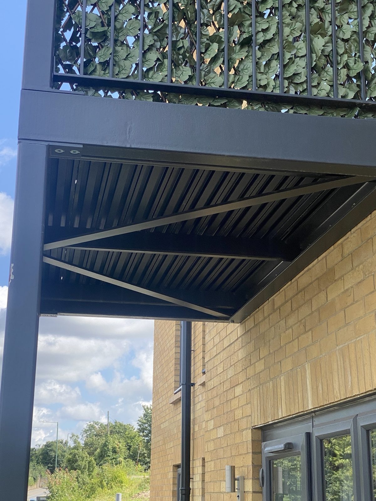 Underside of a steel balcony frame