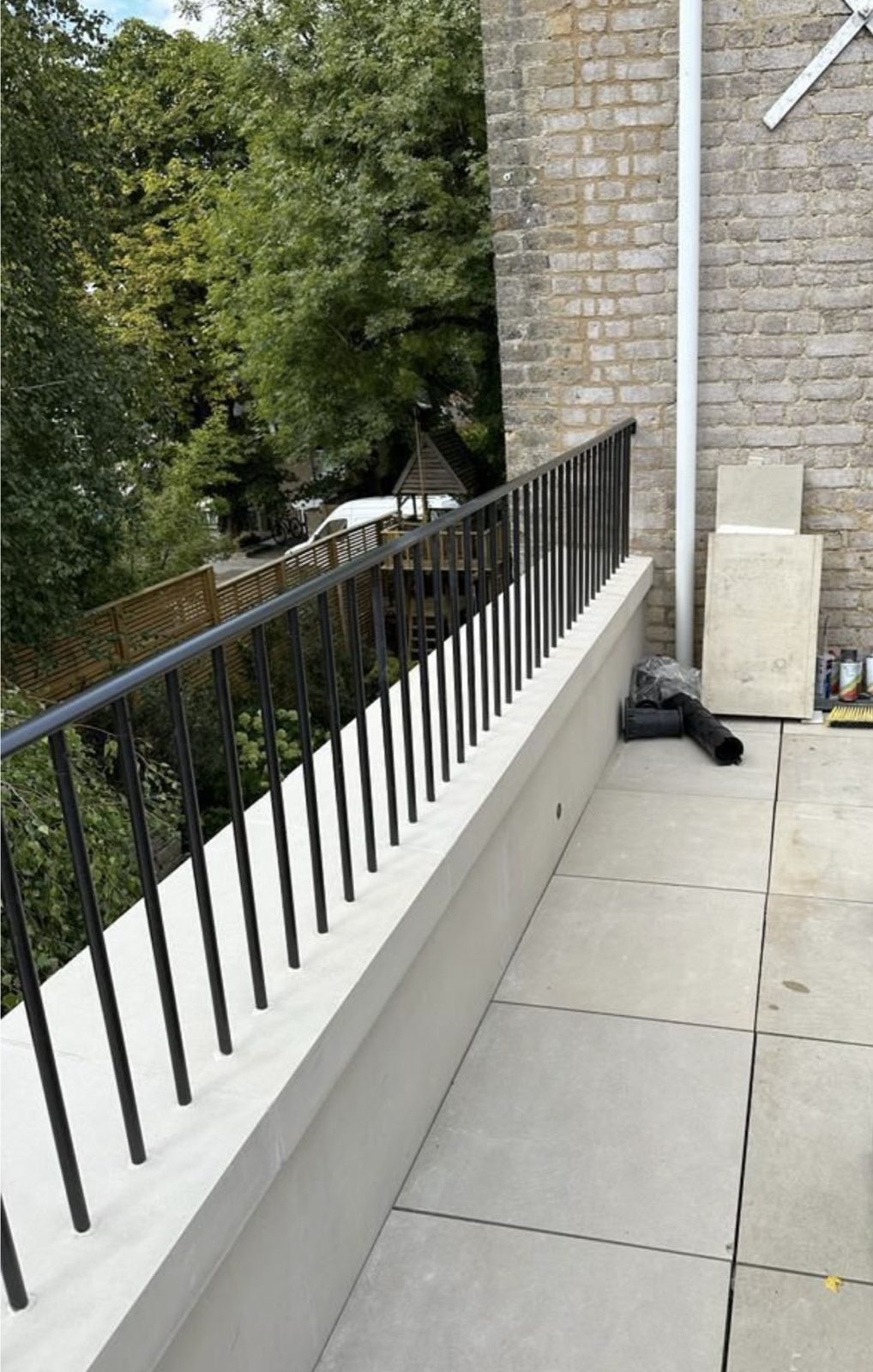 Black steel railings on a terrace